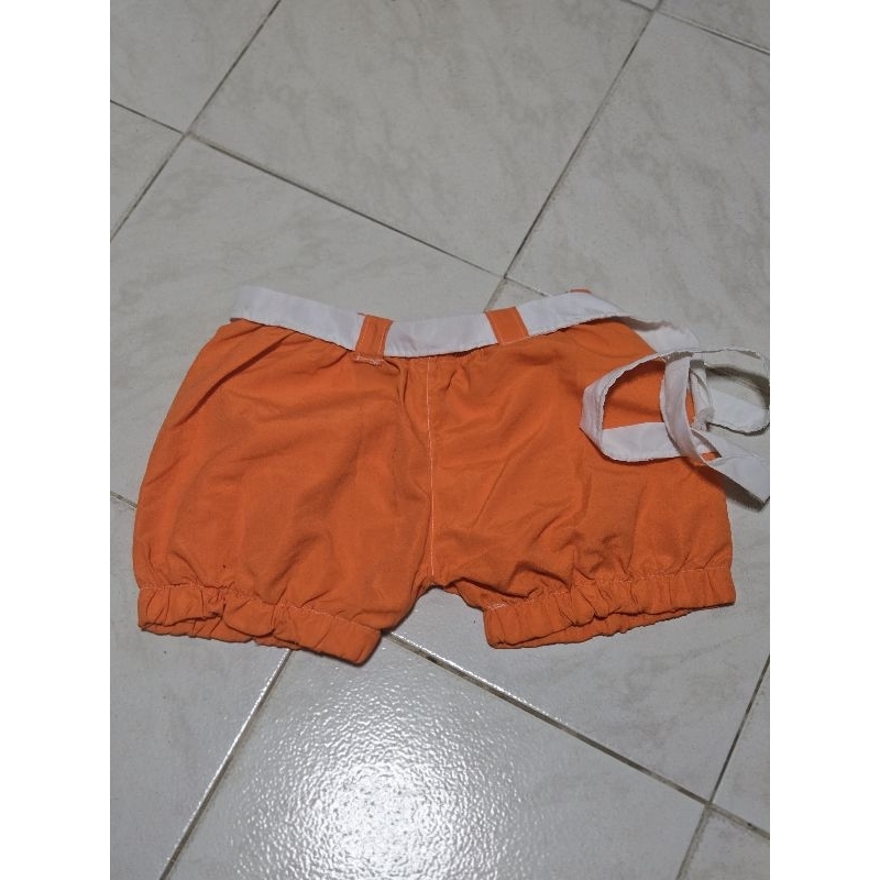 short infantil laranja tam 4.5 anos