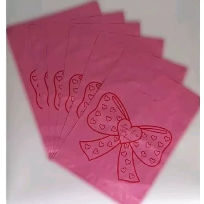 35 Sacolas Plásticas  30×40 LAÇOS FEITO COM