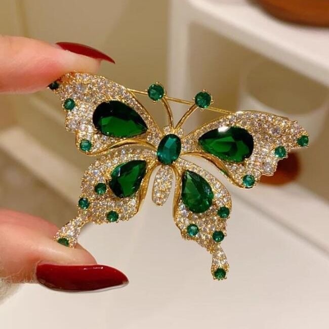 Broche de borboleta com strass verde esmeralda, ac