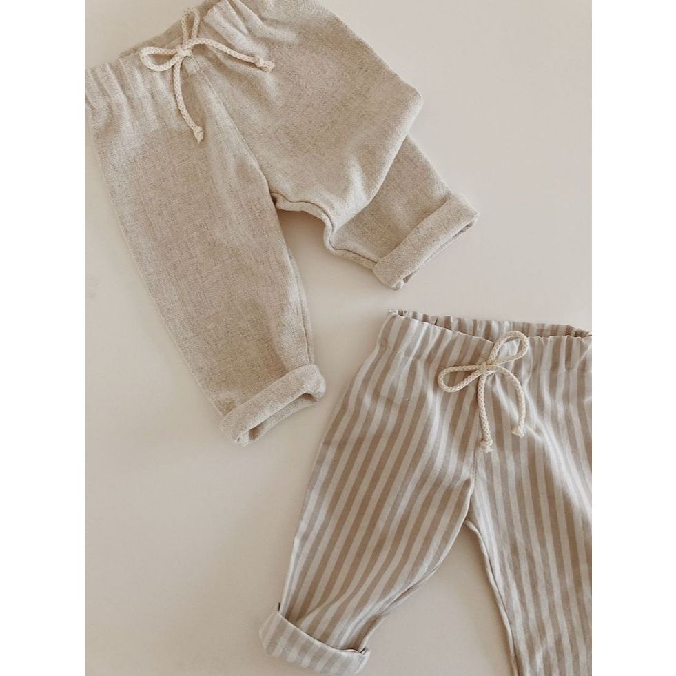 Calça infantil de linho com ajuste na cintura e modelagem confortável Moda kids**E