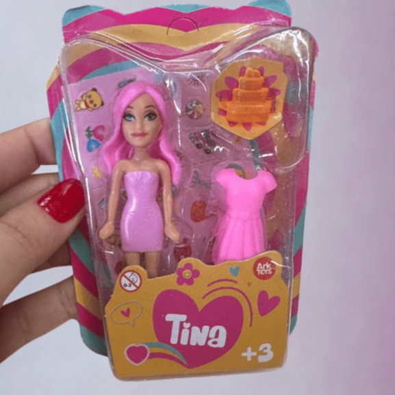 Brinde Boneca Tina