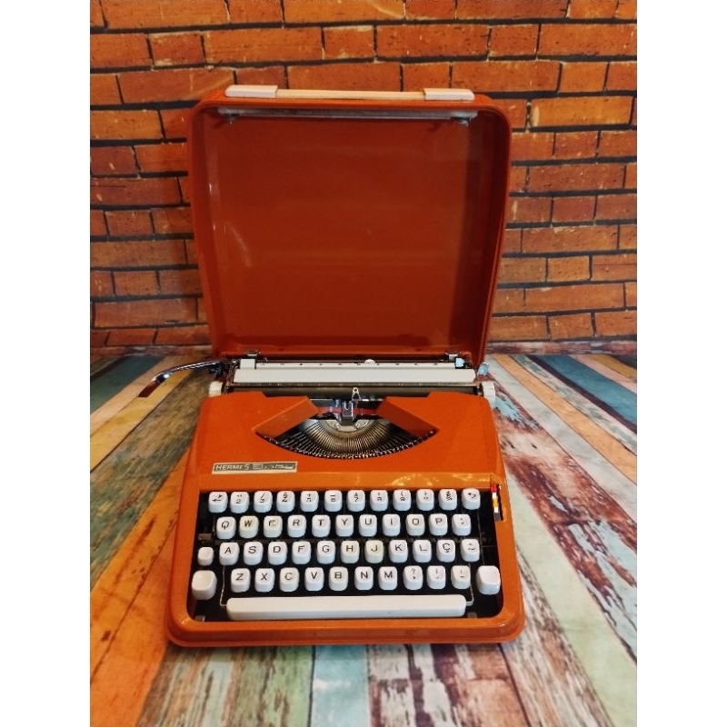 Máquina de Escrever Hermes Baby Vermelha
