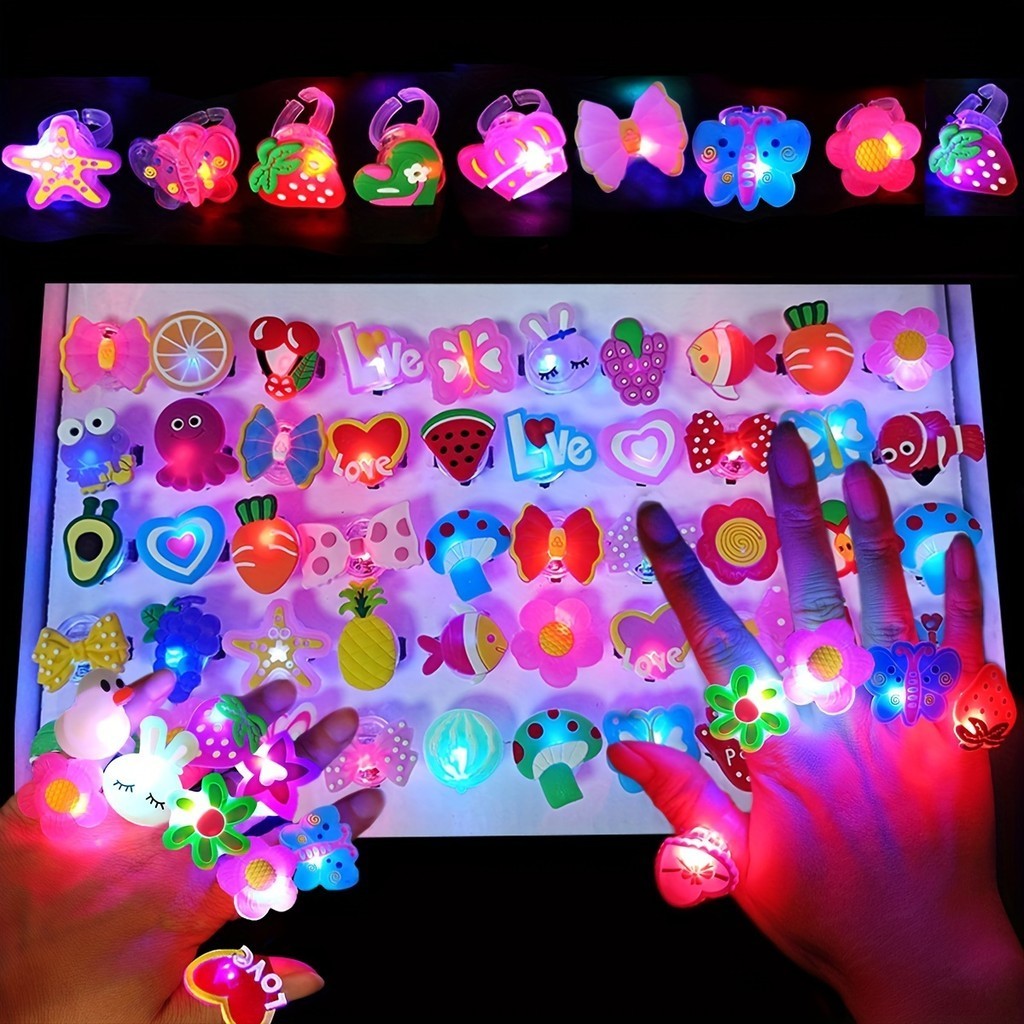 20/50pcs Desenho Animado LED Anéis Luminosos De Dedo Brilham No Escuro Iluminam Os Brinquedos Festa