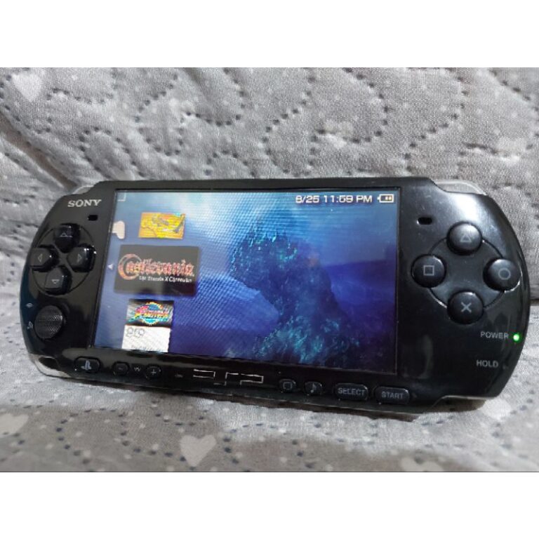 psp com carregador e jogos