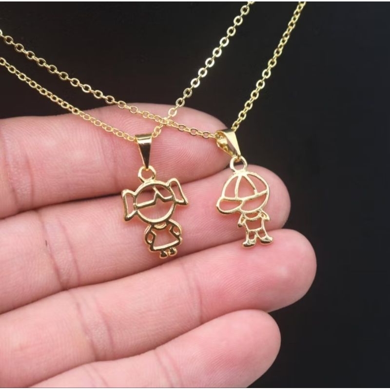 Colar com Pingente de Menina é menino Folheado a Ouro  42cm