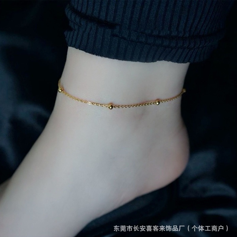 Tornozeleira redonda pequena de aço titânio 18K 