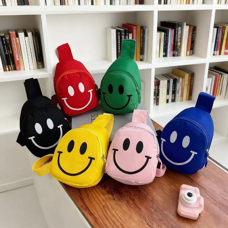 Bolsa infantil estampa sorridente alça de ombro a